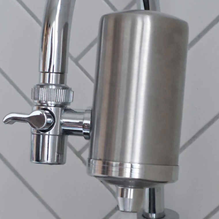 Actual ClearDrop filter attached to a fixed round tap, showing the threaded connection and diverter lever